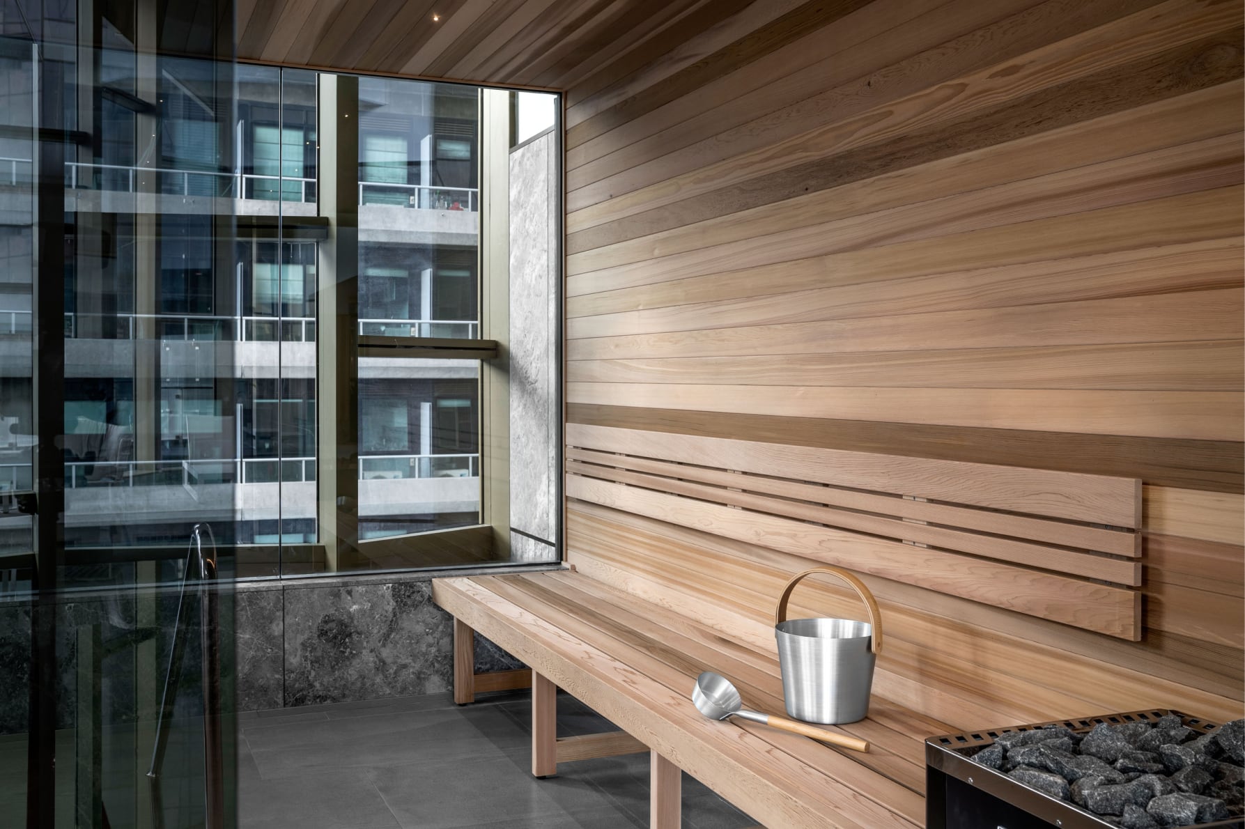 A pool with a steam room and sauna